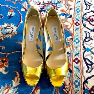 Jimmy Choo gold pumps